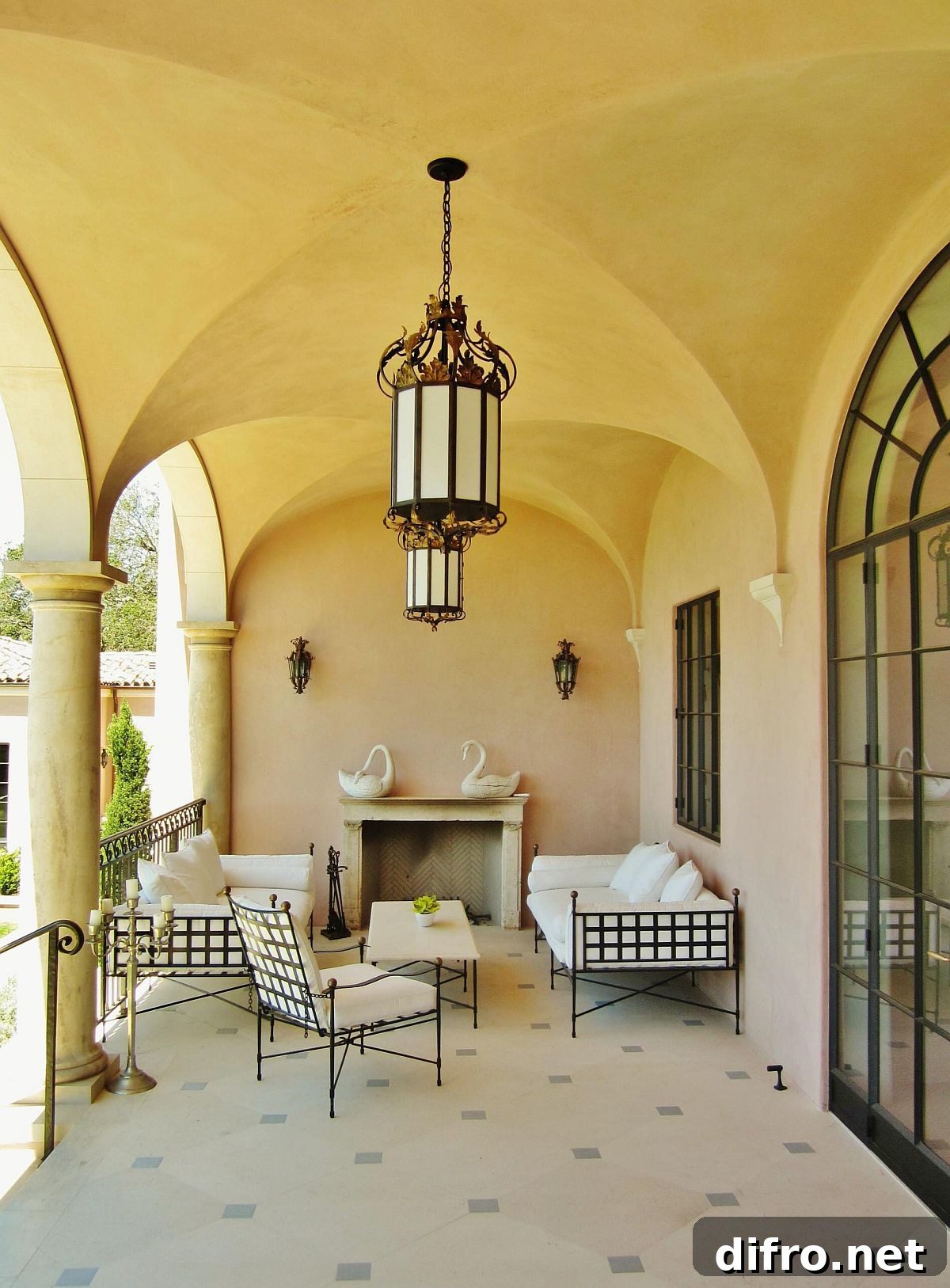 Mediterranean porch with arches and warm yellow glow