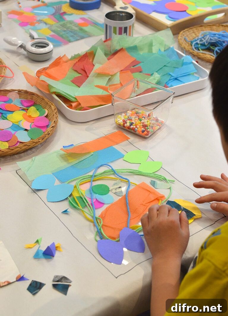 Kids' collage made with clear contact paper