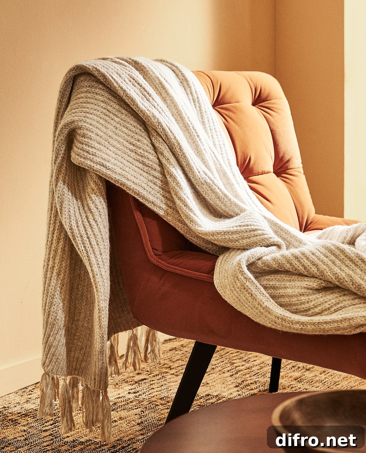 Ribbed knit blanket draped on chair