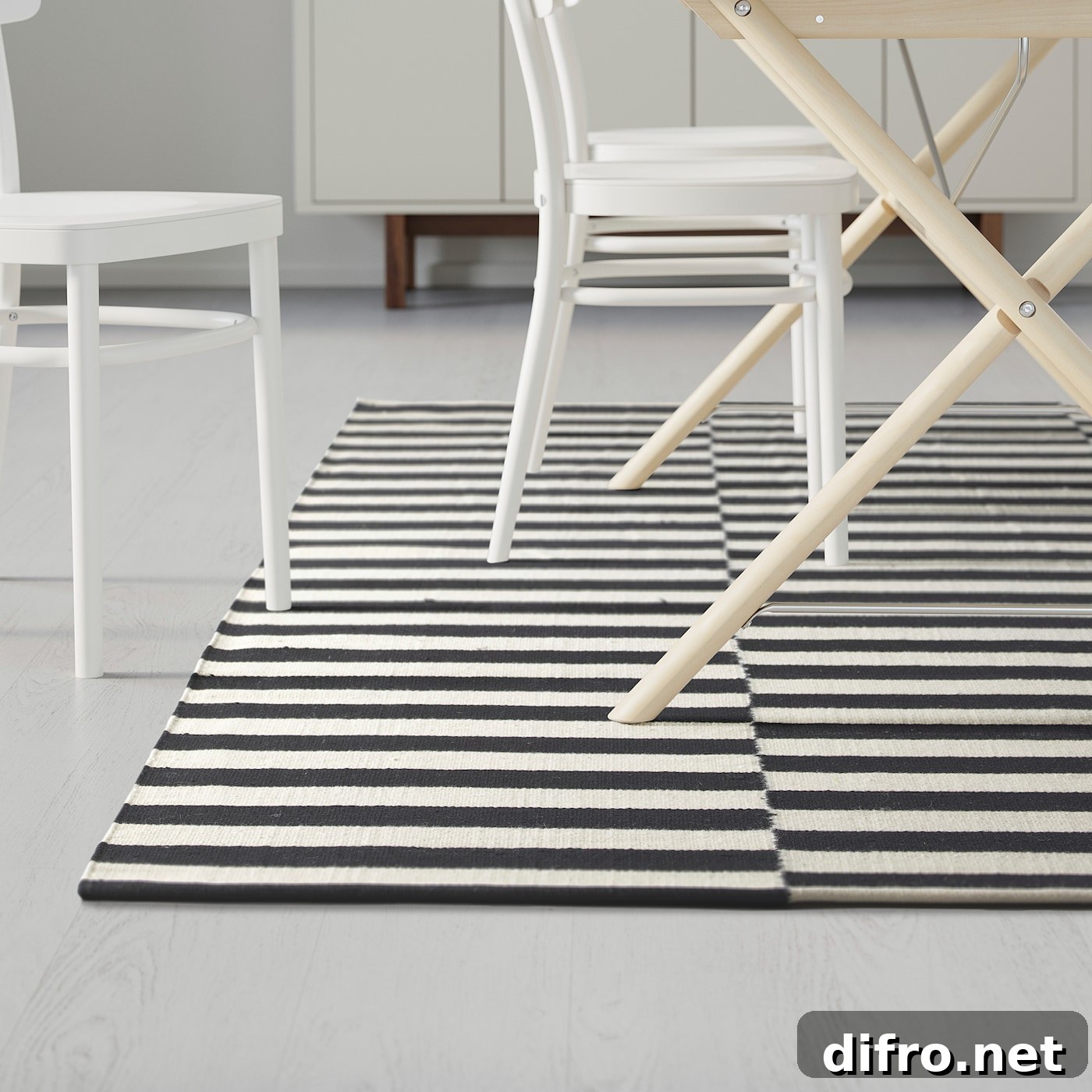 STOCKHOLM rug styled with velvet and leather furnishings