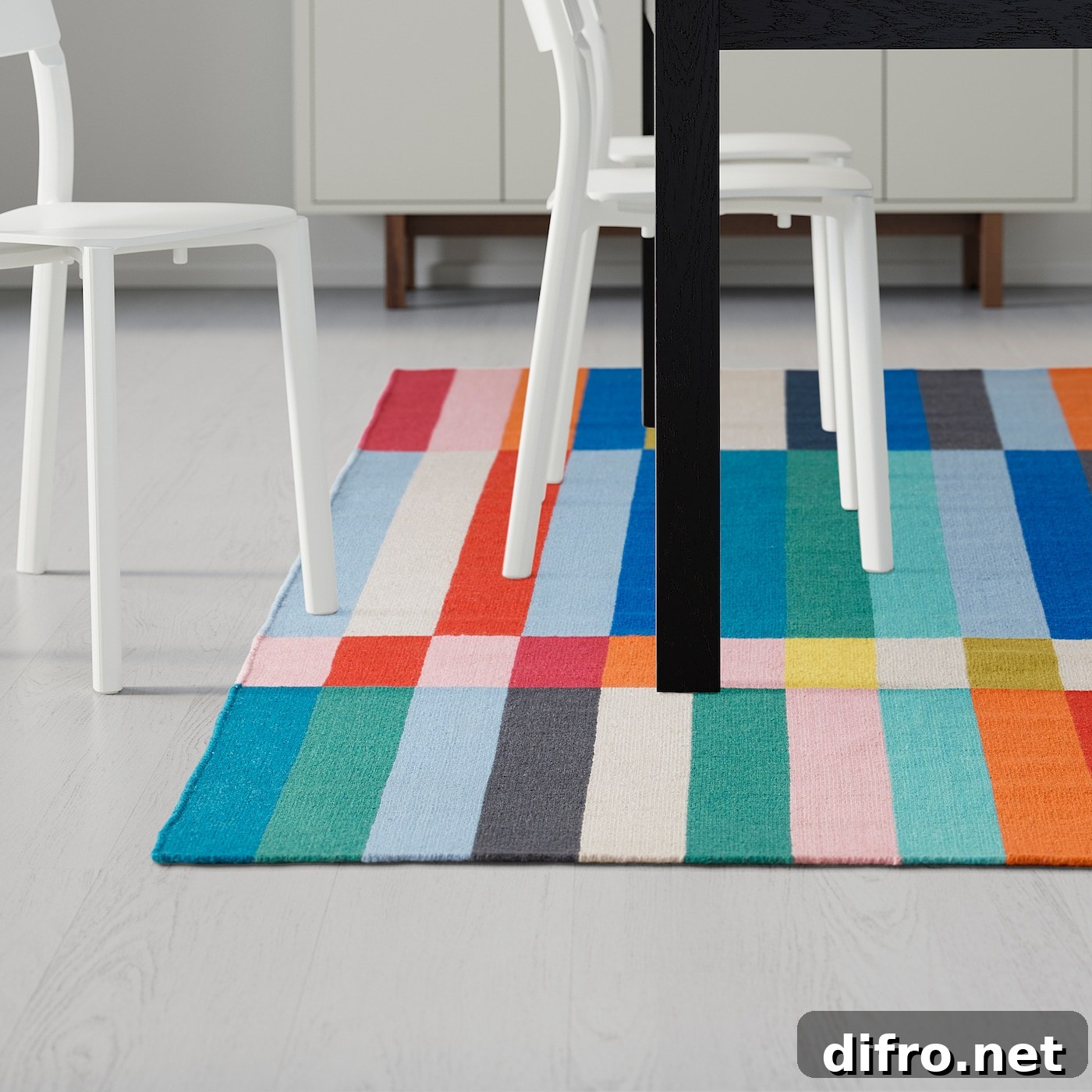 Close-up of HALVED rug showing colorful stripes