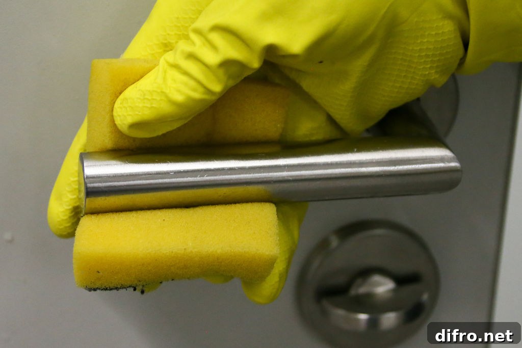 Person cleaning a countertop