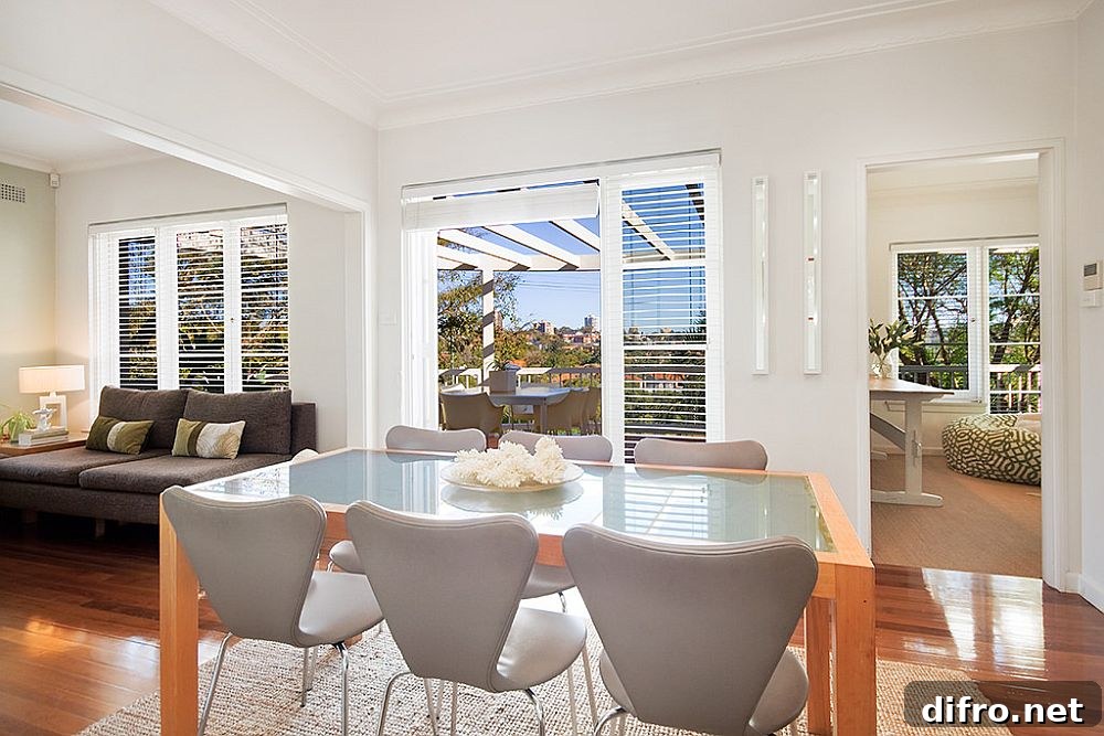 Light-filled dining room connected to the deck and outdoor dining area