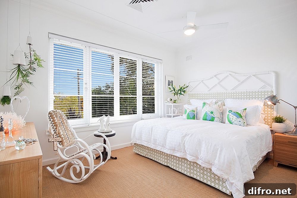 Master bedroom in white and wood offering a cozy warm appeal
