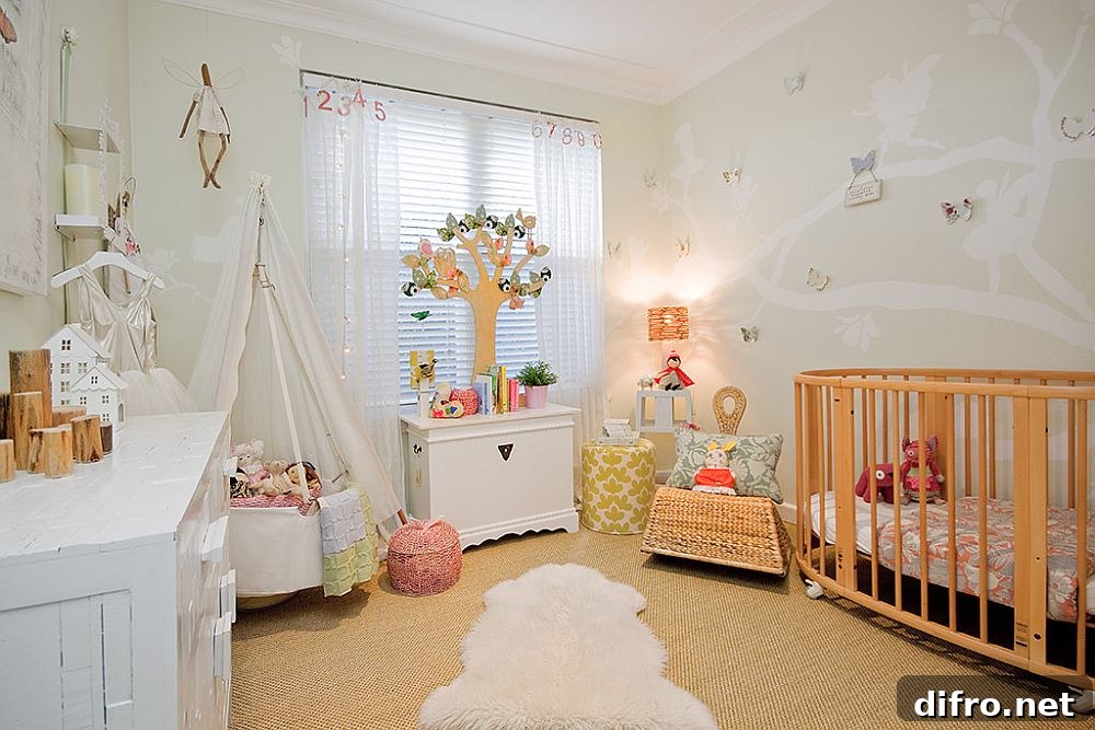 Nursery with custom wall decal, white walls and a play area in the corner