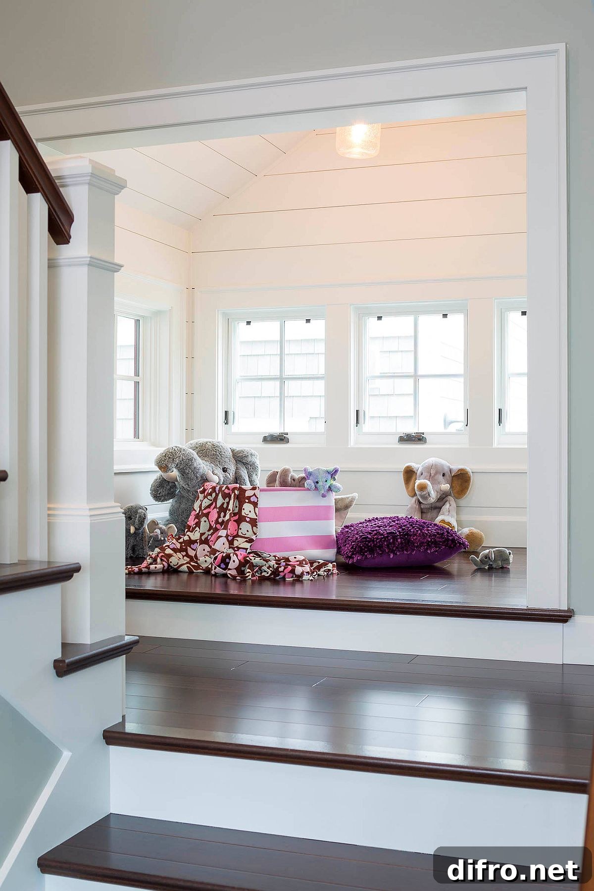 Soft toys and floor cushions in play area