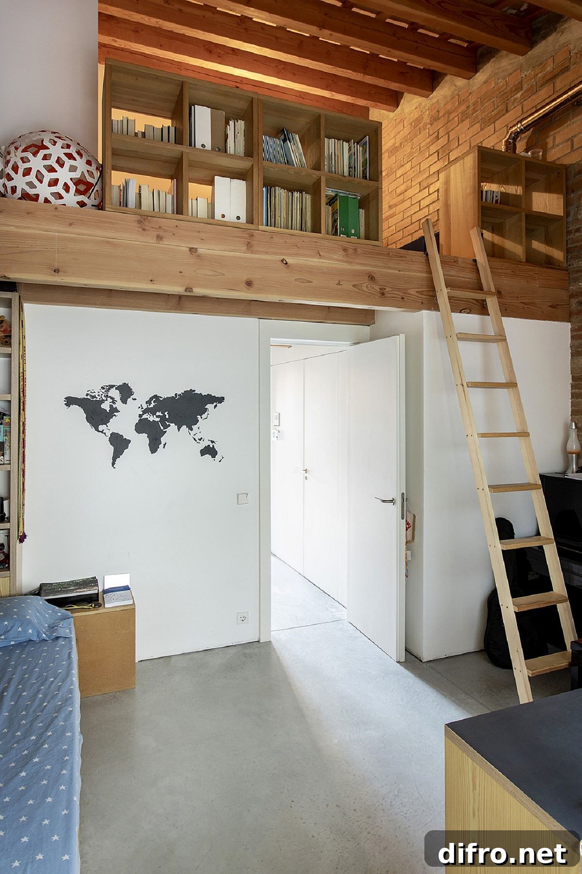 Loft level home office and reading space at Casa EP15340 with exposed brick and wooden ceiling