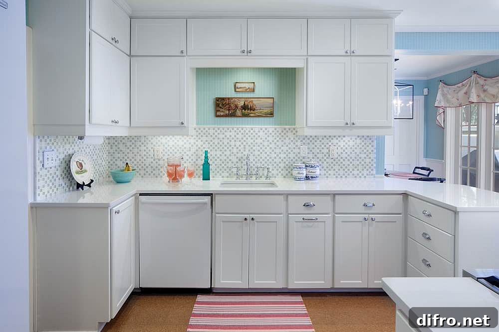 Blue and white modern kitchen with cork flooring that is easy on your eyes and feet