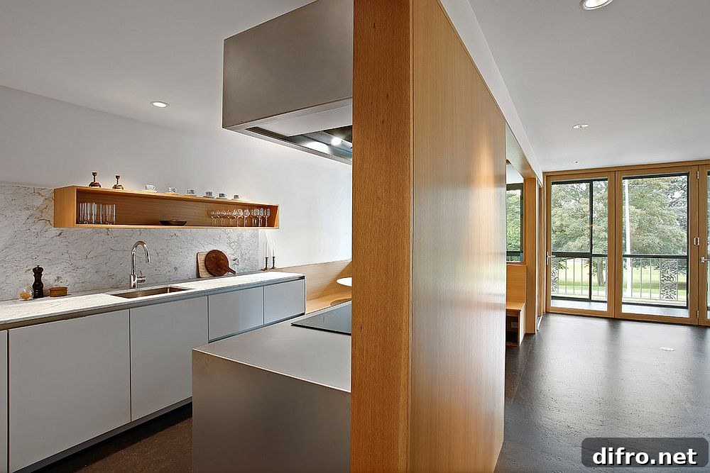 Contemporary kitchen in white and wood with floor in cork