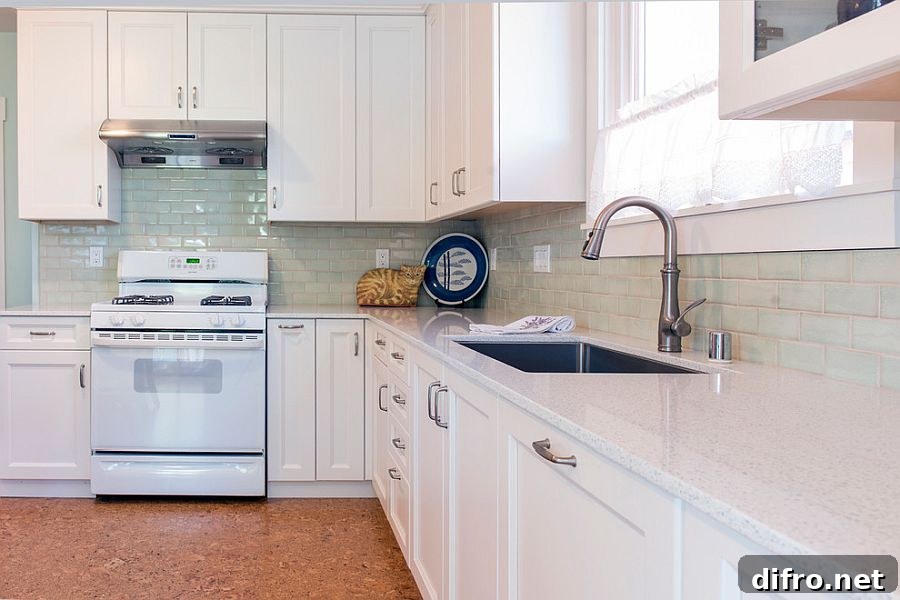 Modest modern kitchen in white with cozy cork floor