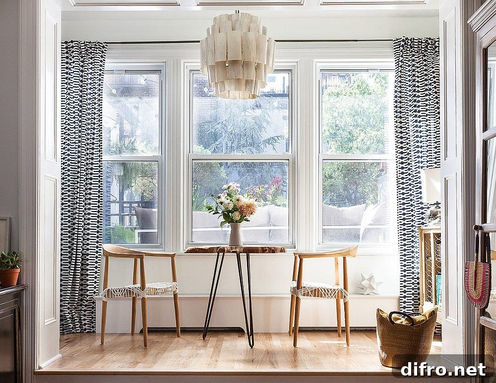 Small sitting area with chairs and live-edge table