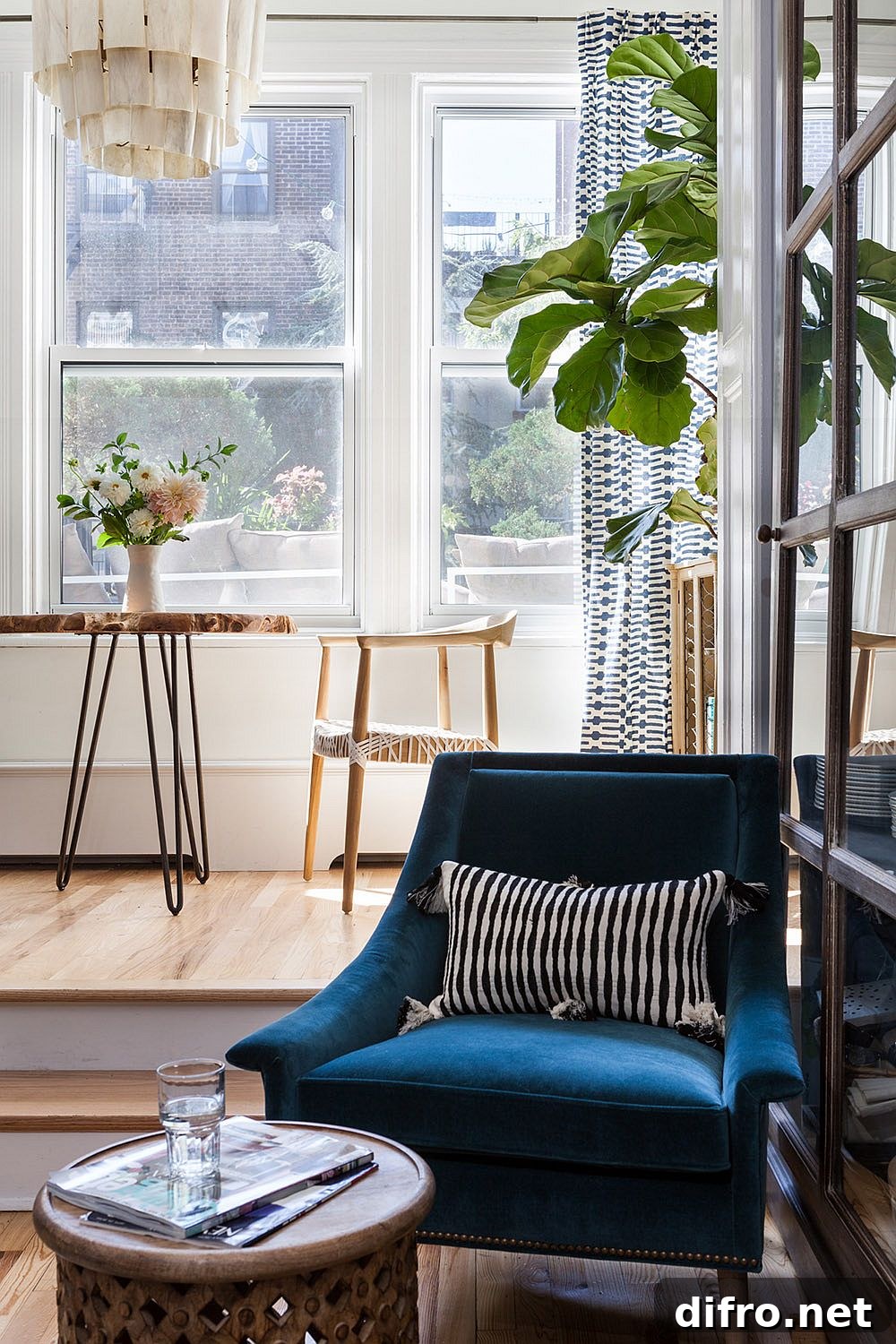 Blue club chair in neutral living room