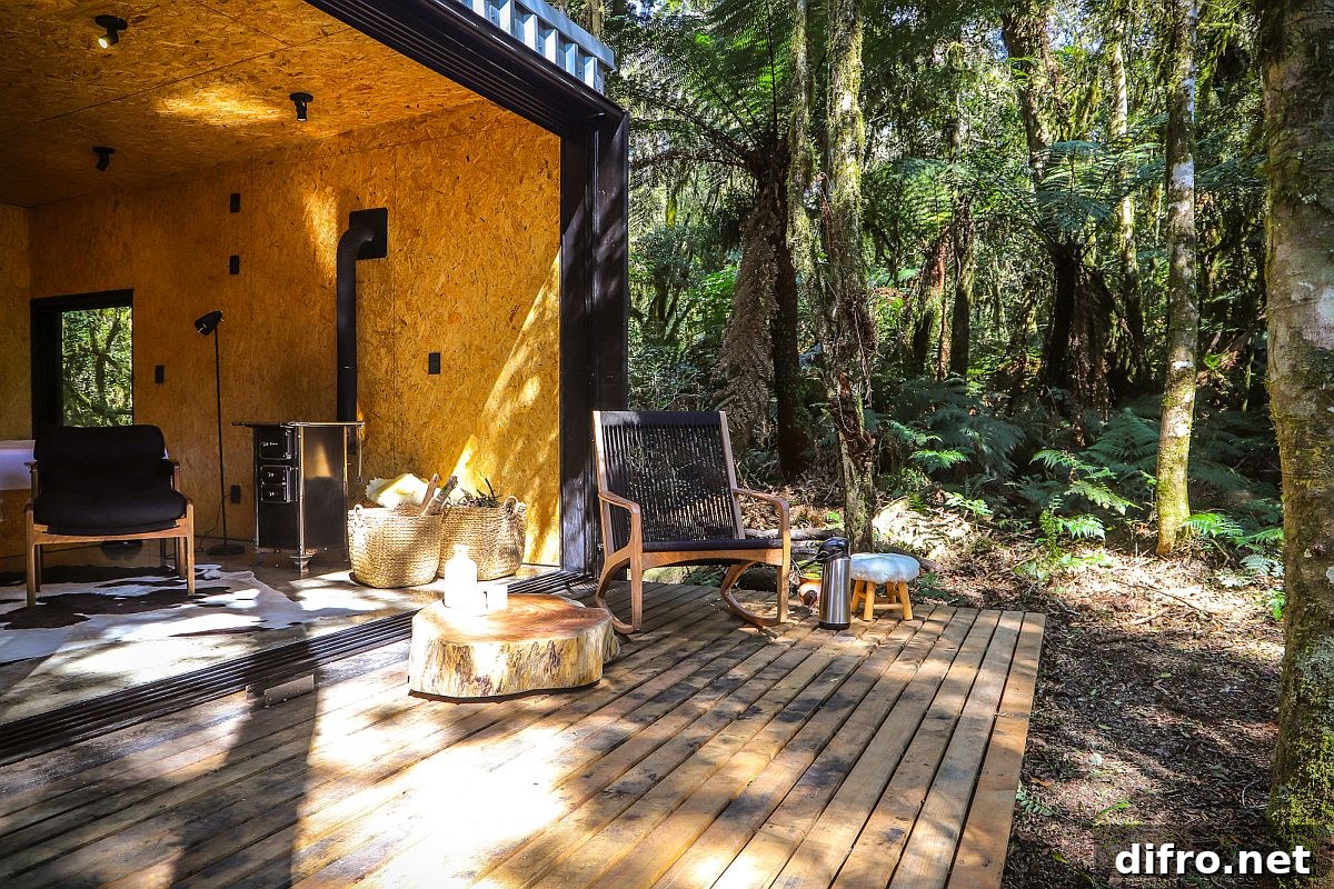Cozy wooden panels and deck add a more natural vibe to the cabin-style vacation home