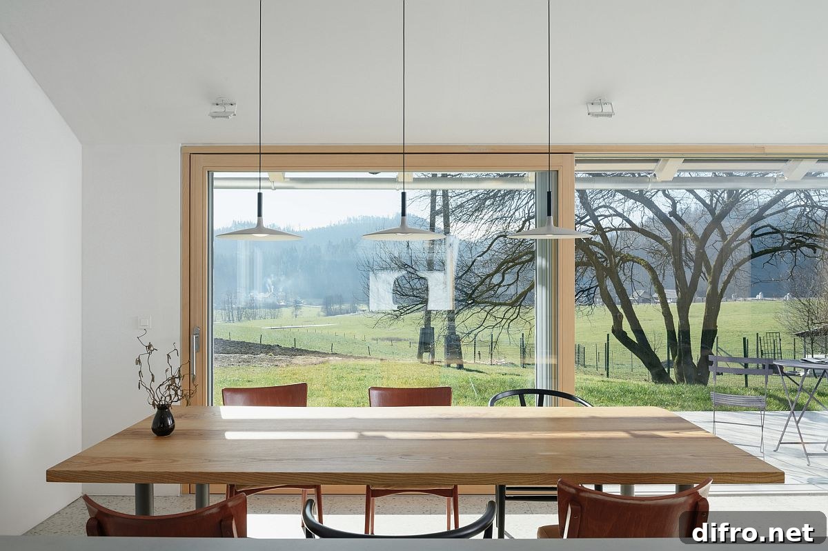 Dining room with wooden table and views