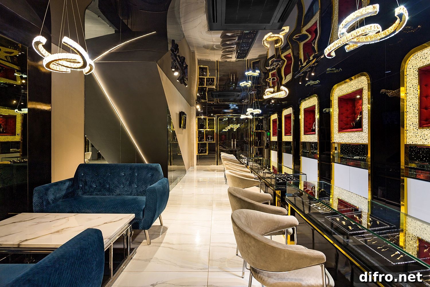 Interior of contemporary jewelry store in black, gold and a hint of red