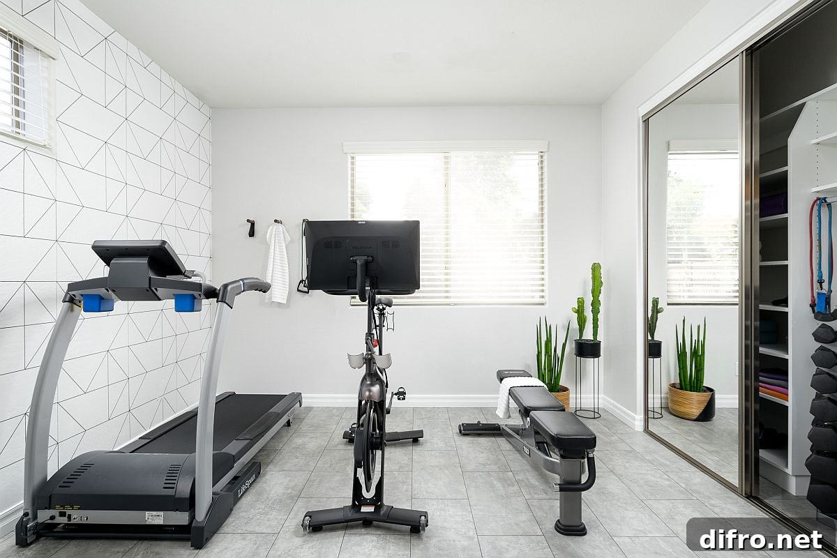 Small home gym in white with sliding glass door cabinet