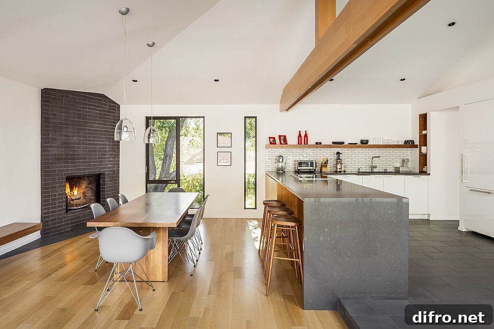 White, wood and gray kitchen and dining room