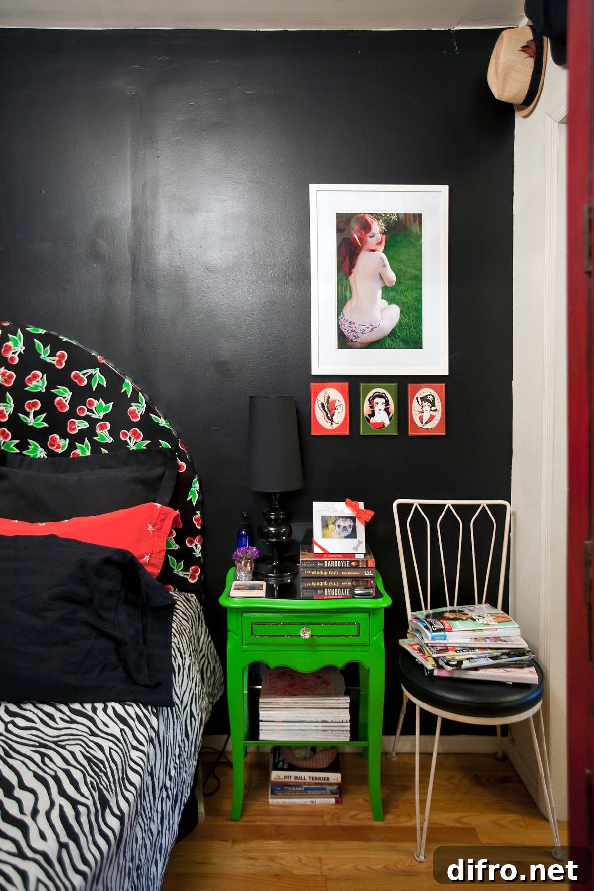 Tiny New York bedroom transformed with black wall and colorful decor