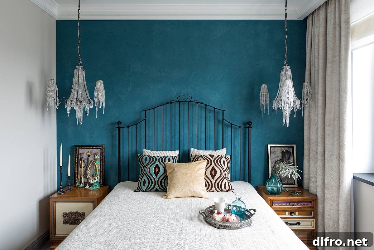 White bedroom with deep blue accent wall and eclectic touches