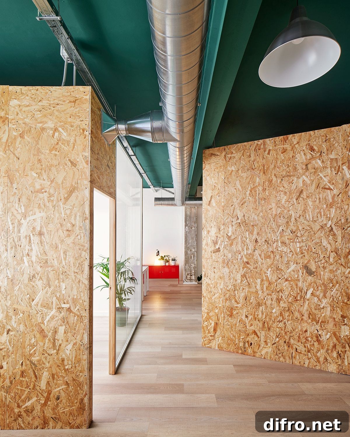 Preserved industrial elements like exposed brick and timber in the office interior