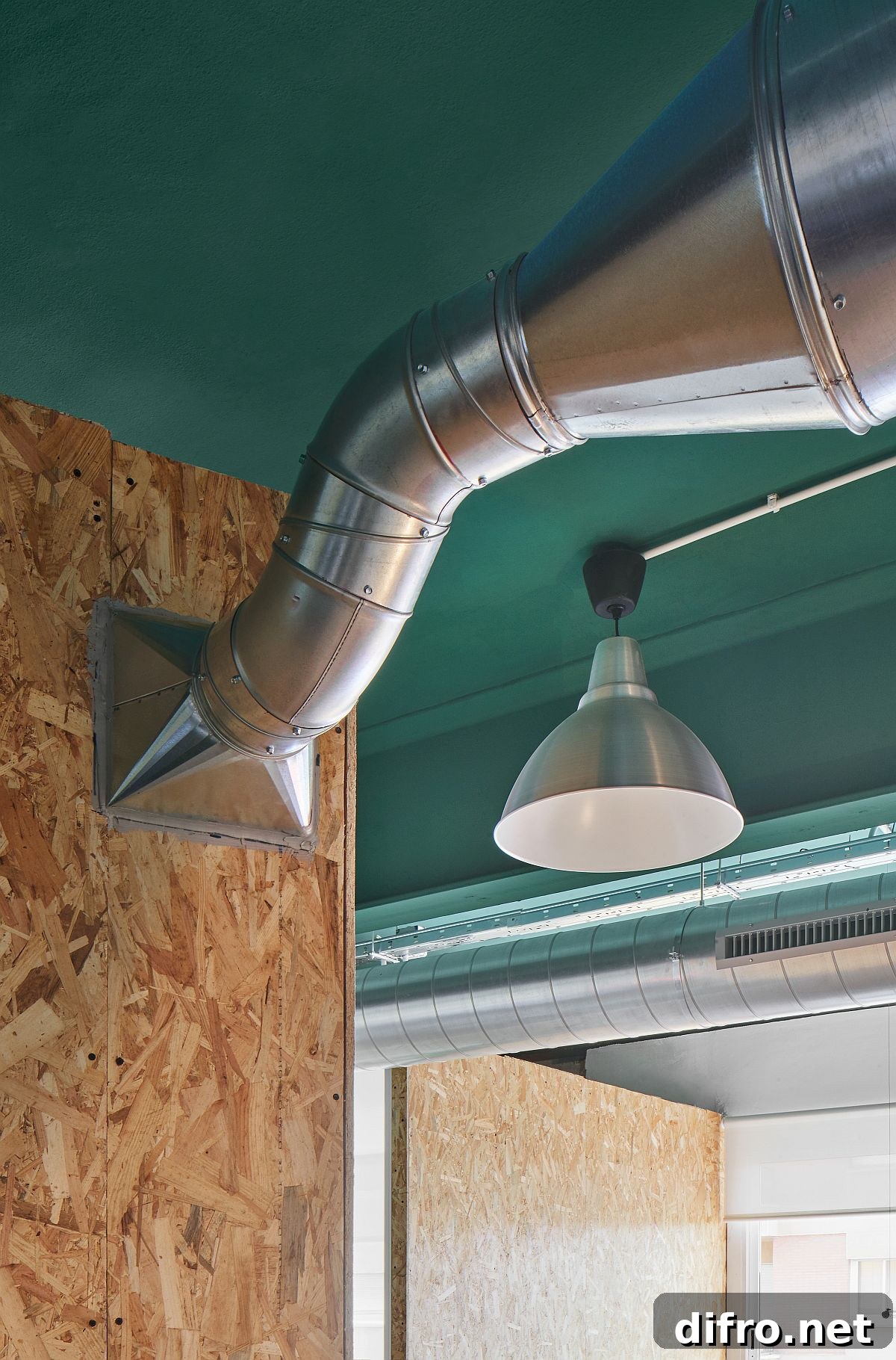 Striking industrial elements create visual impact in the office