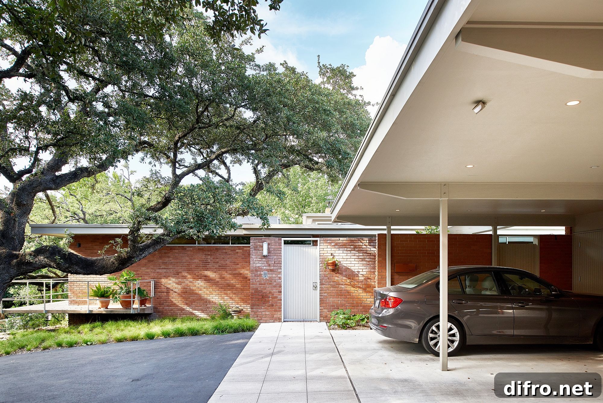Carport and entry at the Balcones Residence