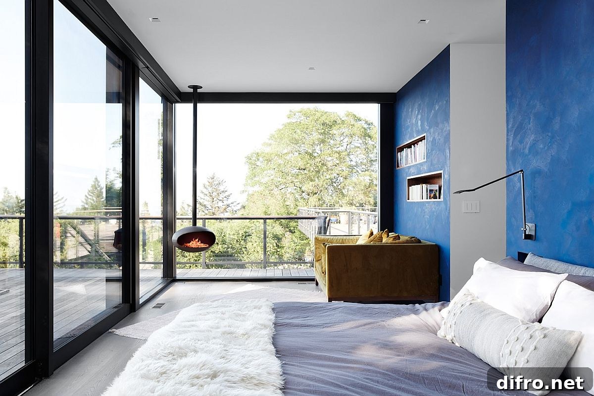 Interior view from within a glass-walled bedroom