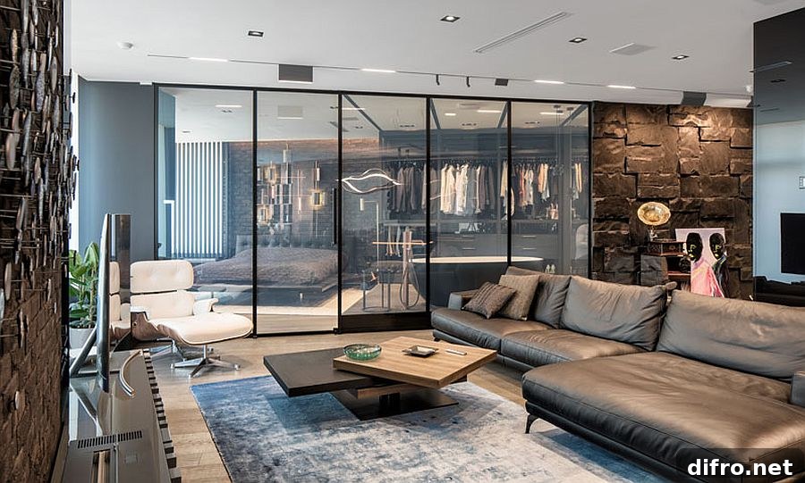 Combination of glass and stone in a compact apartment
