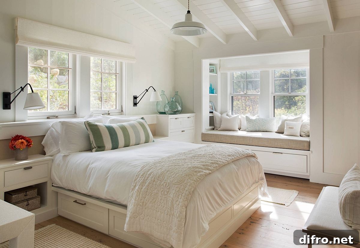 Monochromatic bedroom with built-in window seat