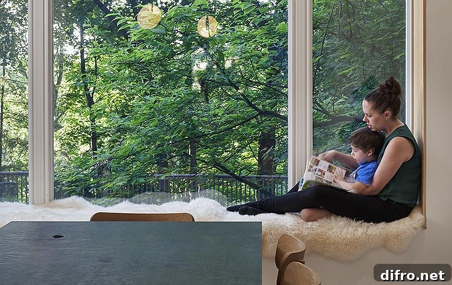 Wood-lined window sill dressed with a plush rug for seating