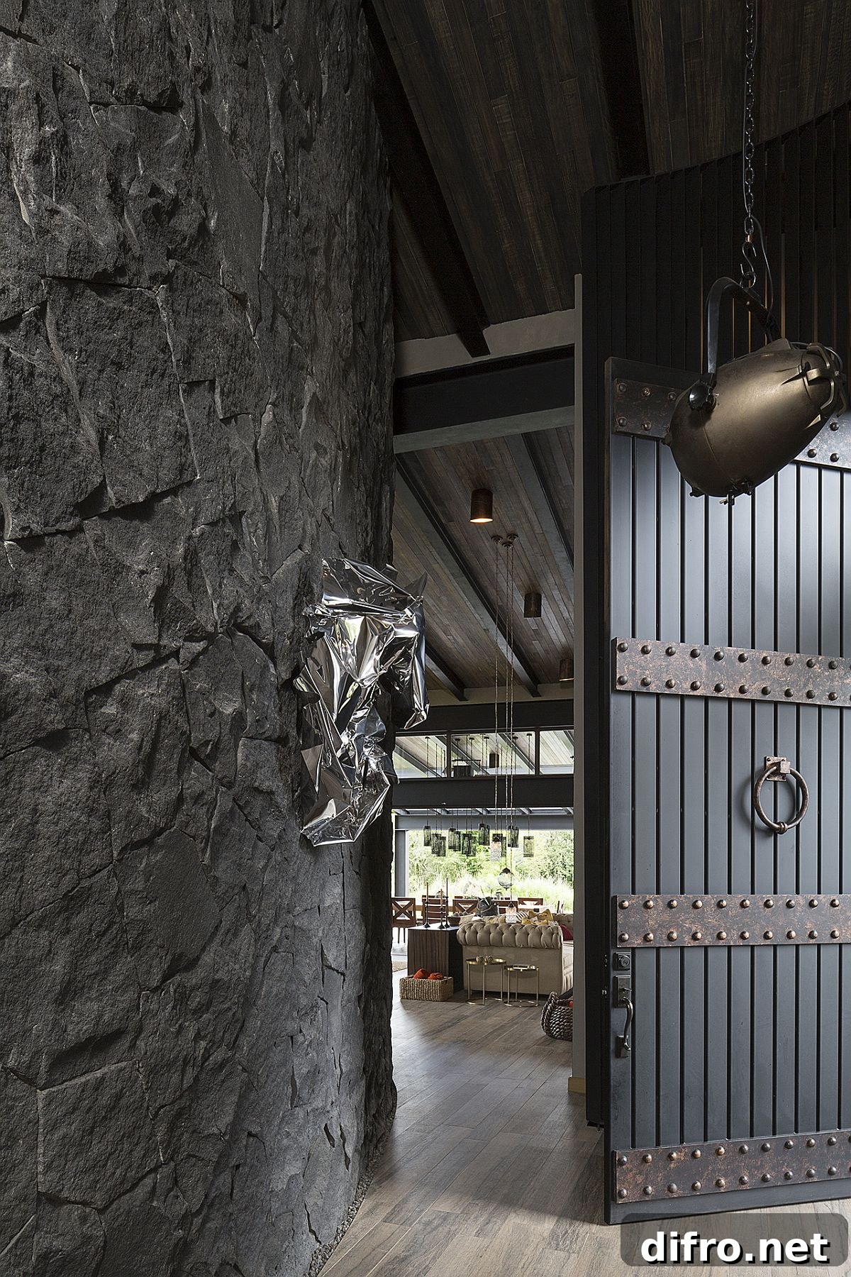 Entrance with traditional Mexican design touches and volcanic stone walls