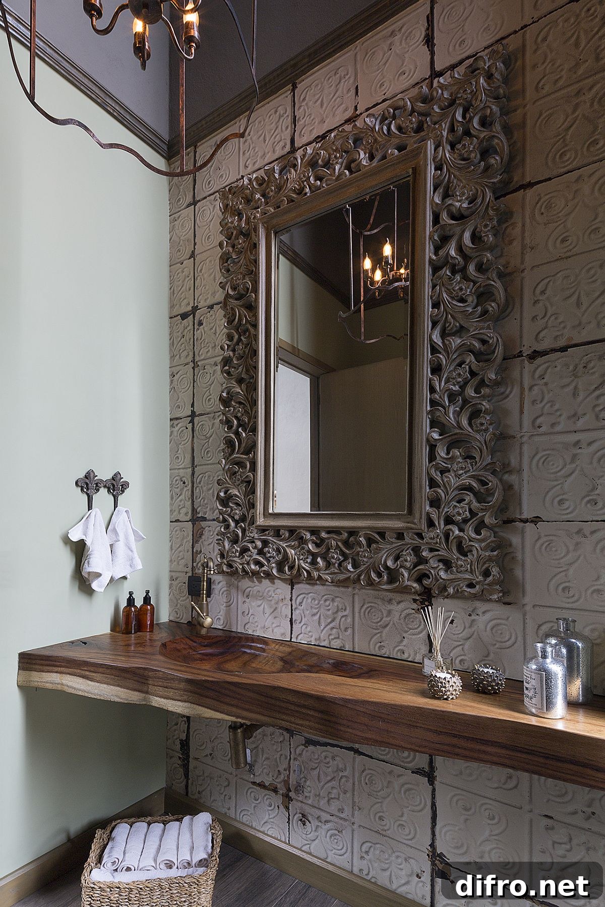 Custom mirror frame and vanity in a rustic bathroom