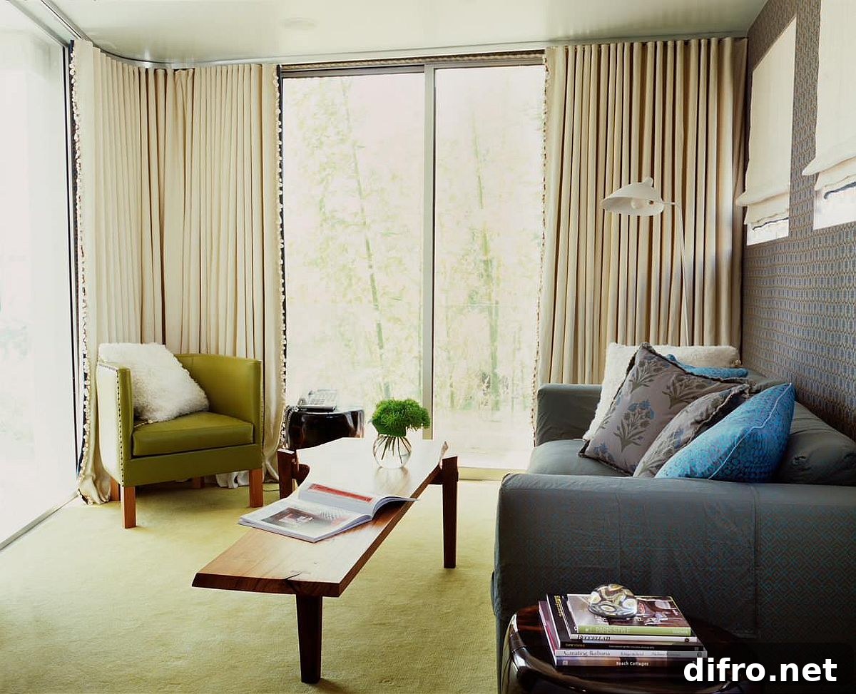 living room with olive green rug and chair for accent