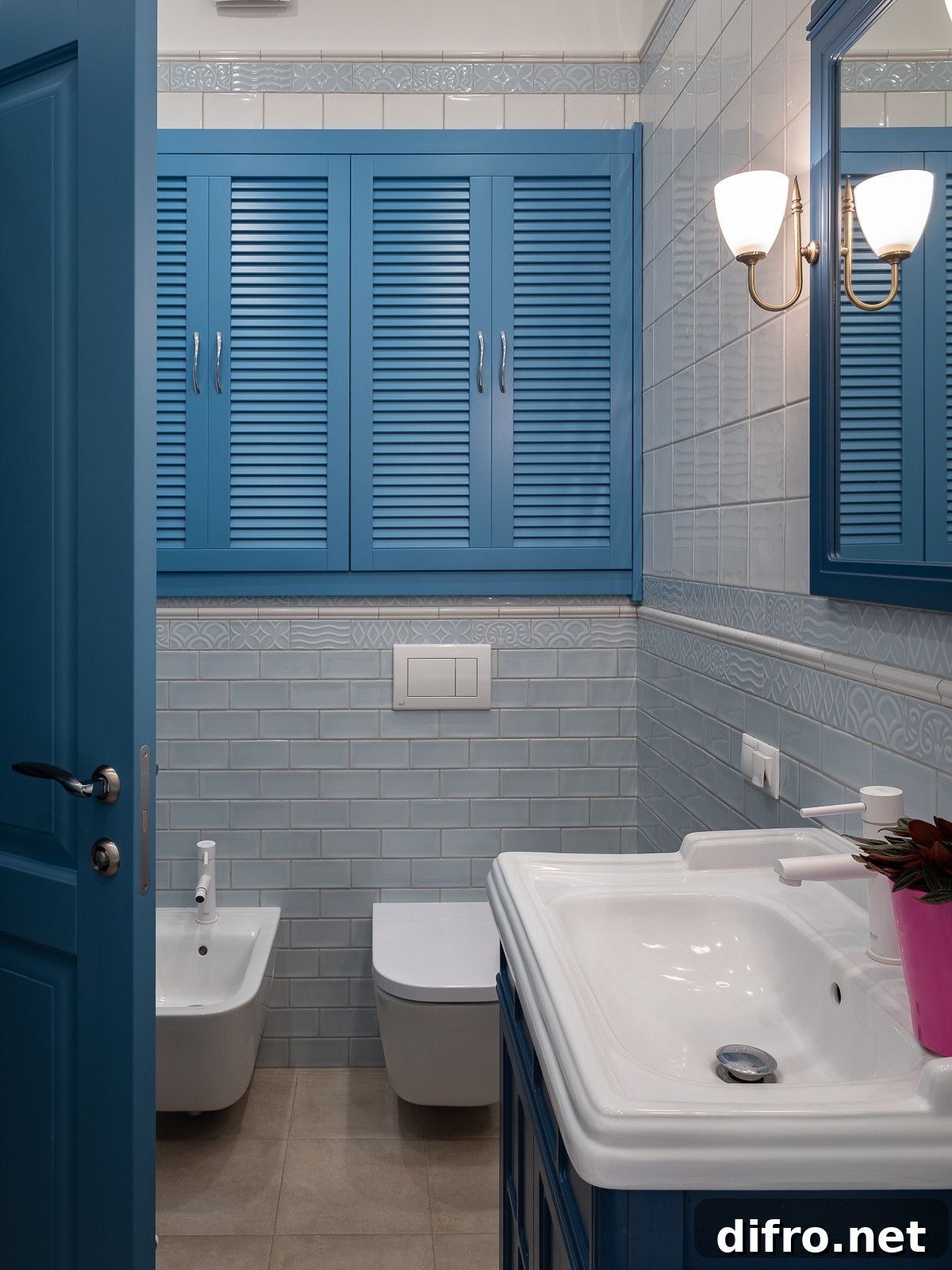Blue shutters and vanity in a traditional bathroom