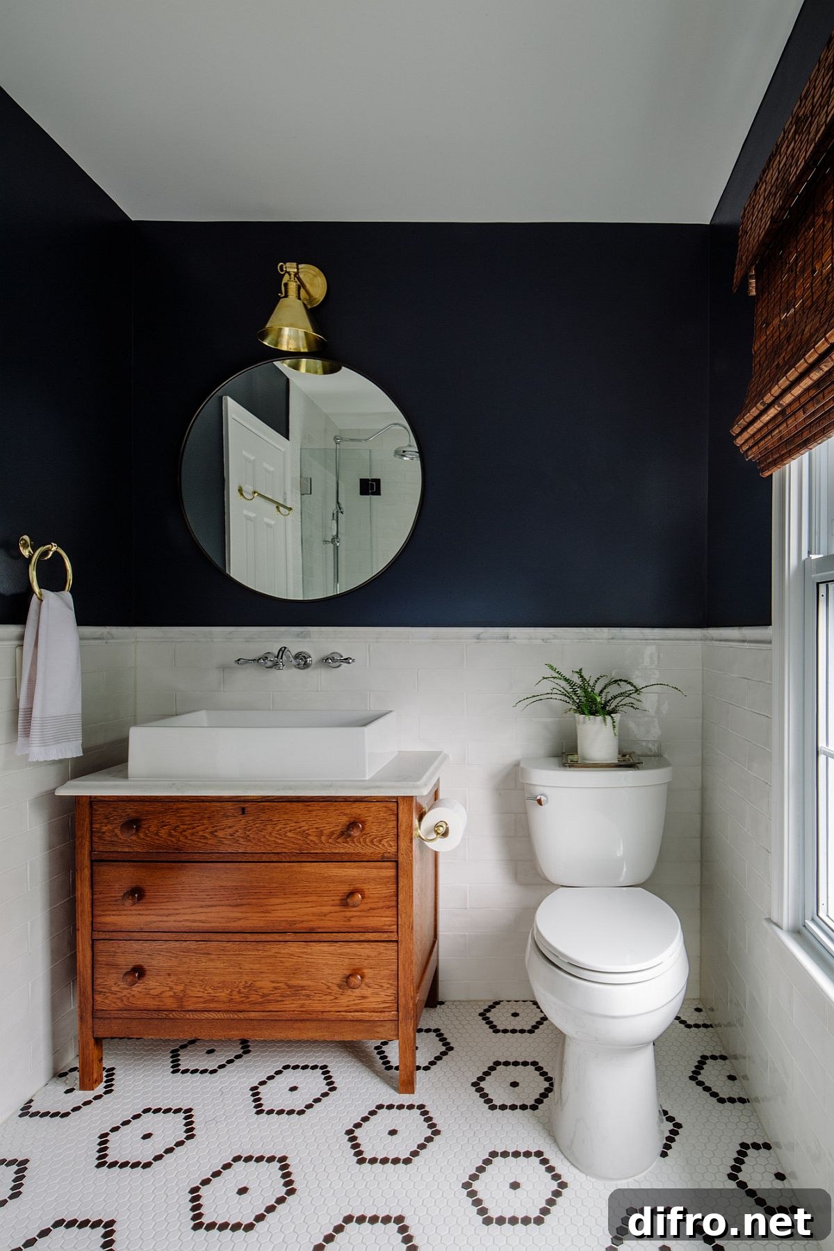 Deep navy blue and white in a small modern bathroom