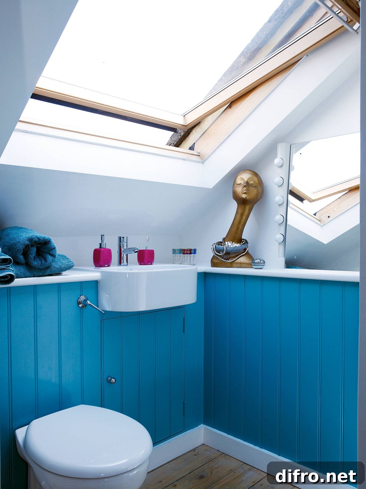 Attic bathroom in blue and white with natural light