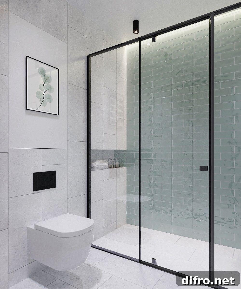 Light blue tiles in the shower area add just a hint of color