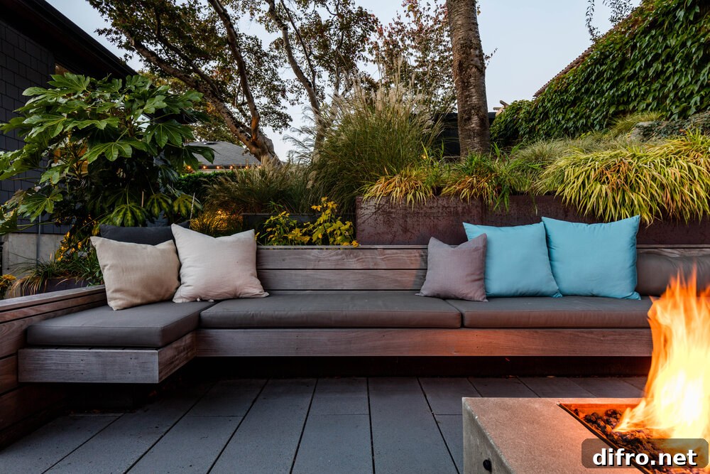 Custom ipe wood benches and cushions create a lovely outdoor sitting area