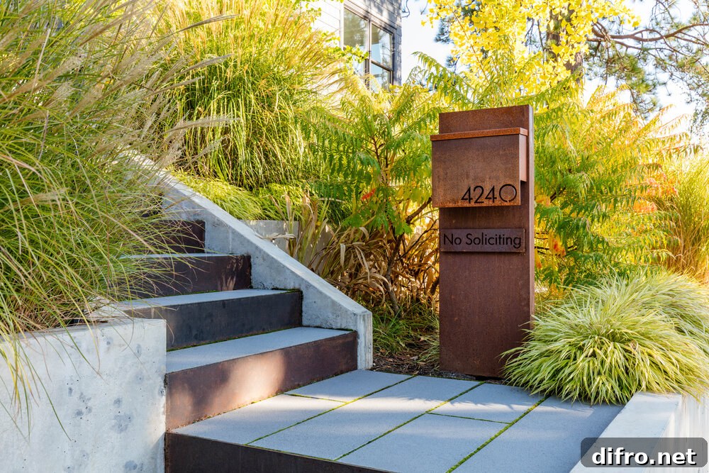 New post box of the house with custom metal design also displays the number