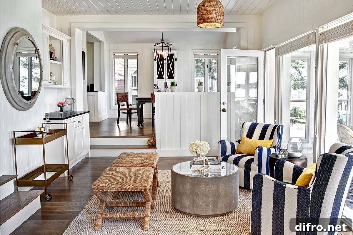 Blue and white striped chairs in a modern beach-style living room
