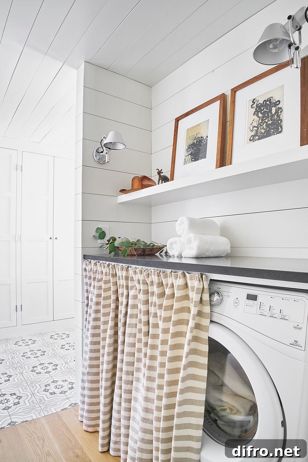 Hide away the laundry area when it is not in use with a small curtain