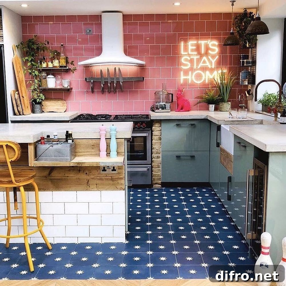 Color-filled kitchen in blue and pink with dashing neon sign