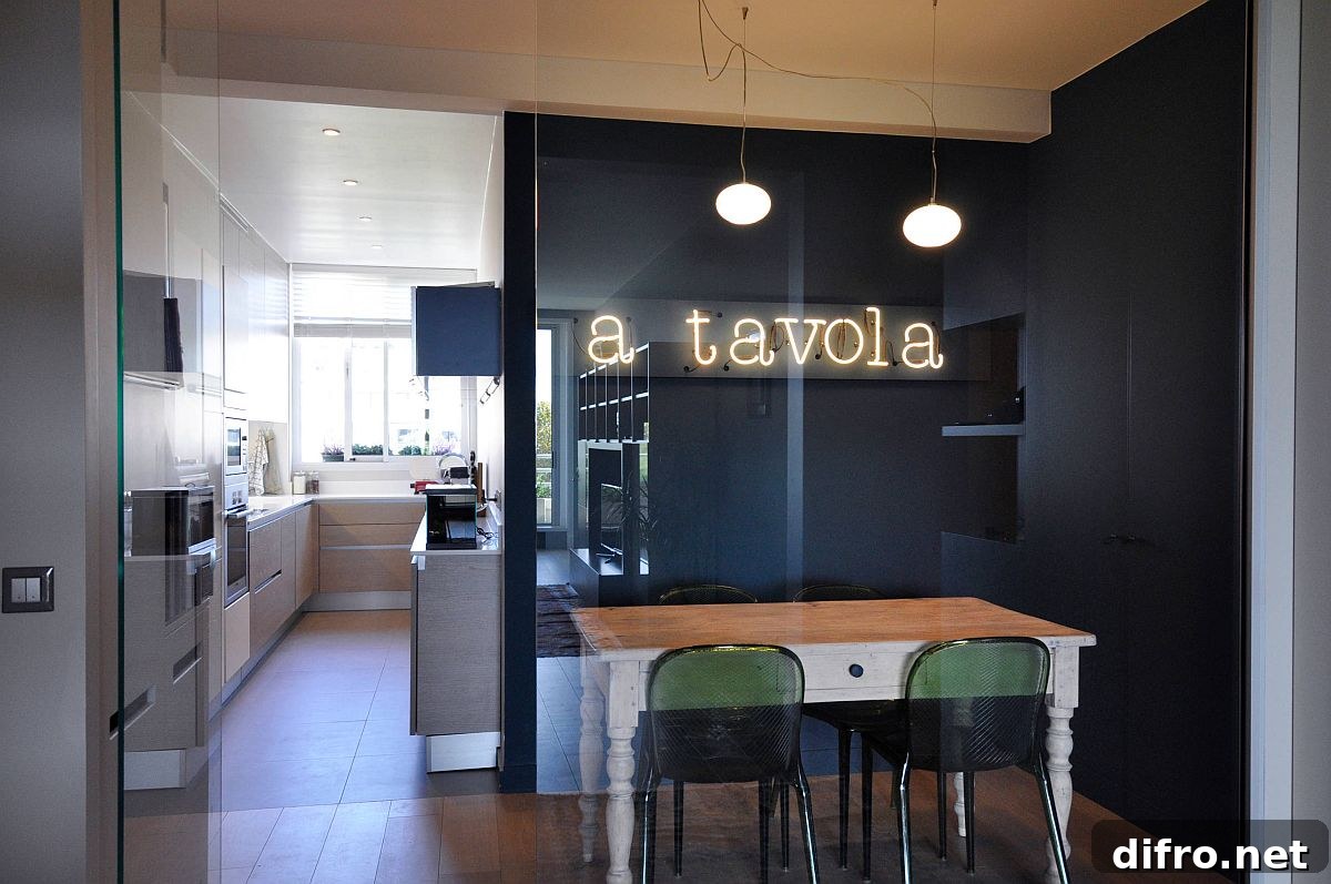 Eat-in kitchen of Paris apartment with a gorgeous neon sign