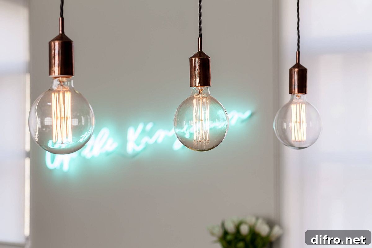 Edison bulb lighting combined with sparkling neon sign in the contemporary kitchen