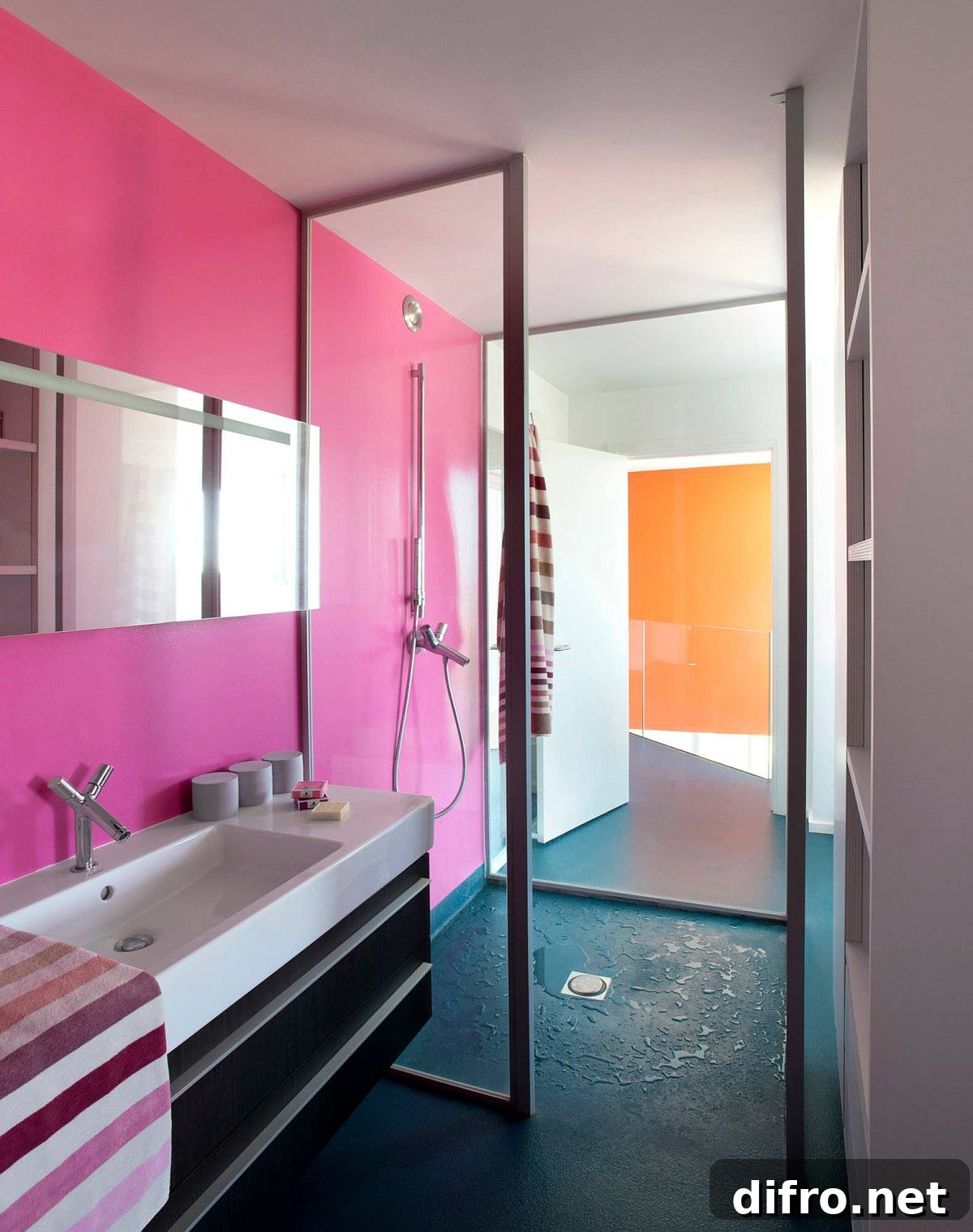 Blue floor with pink walls in a contemporary bathroom