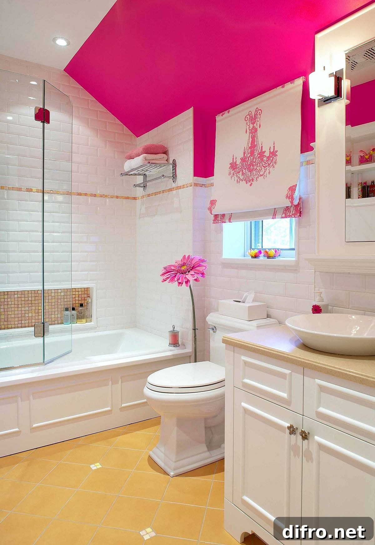 Small pops of pink accentuating a modern white bathroom
