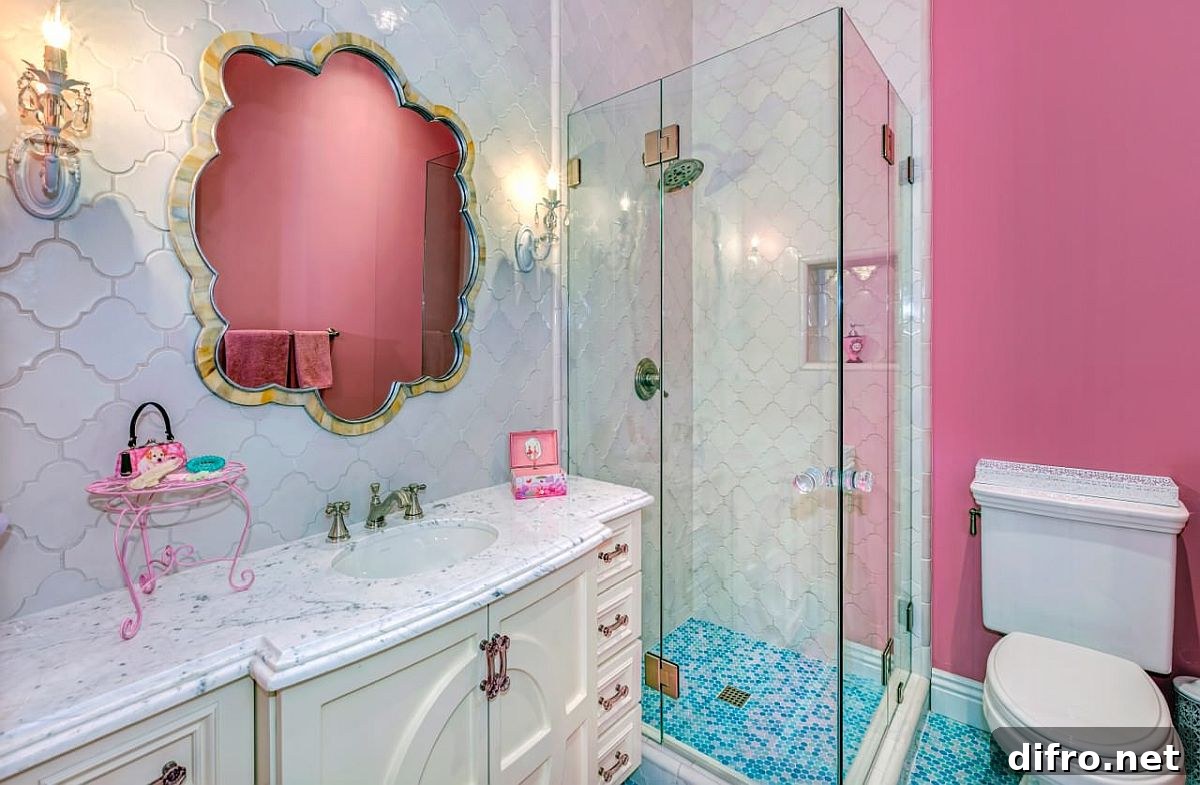 Reflection of a pink accent wall in a bathroom mirror