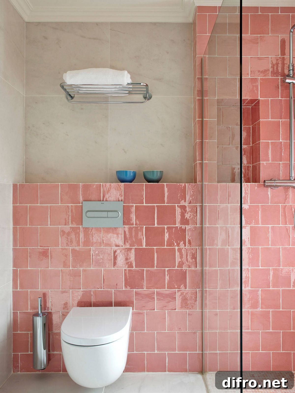 Eclectic bathroom with pink tile in the shower area