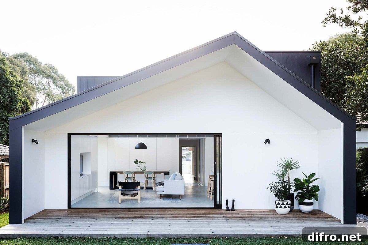 Shed-style rear extension in white with dark trims