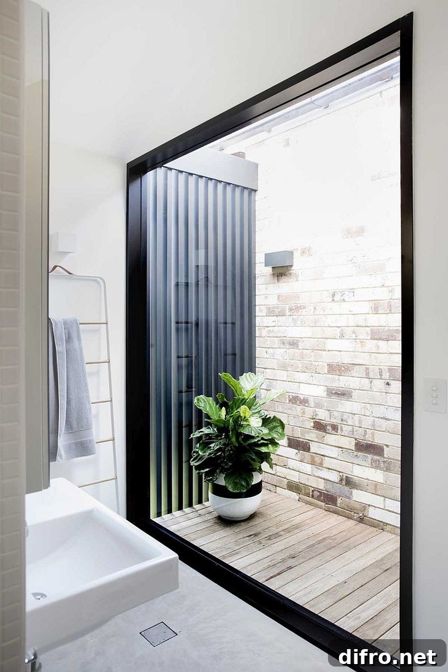White bathroom with large window